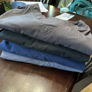 4 scrub shirts